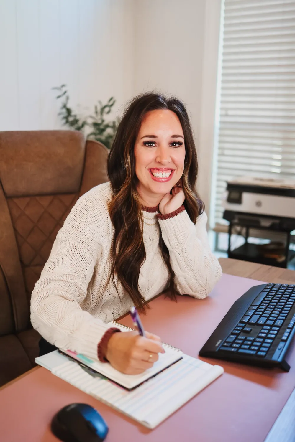Brittany at her desk